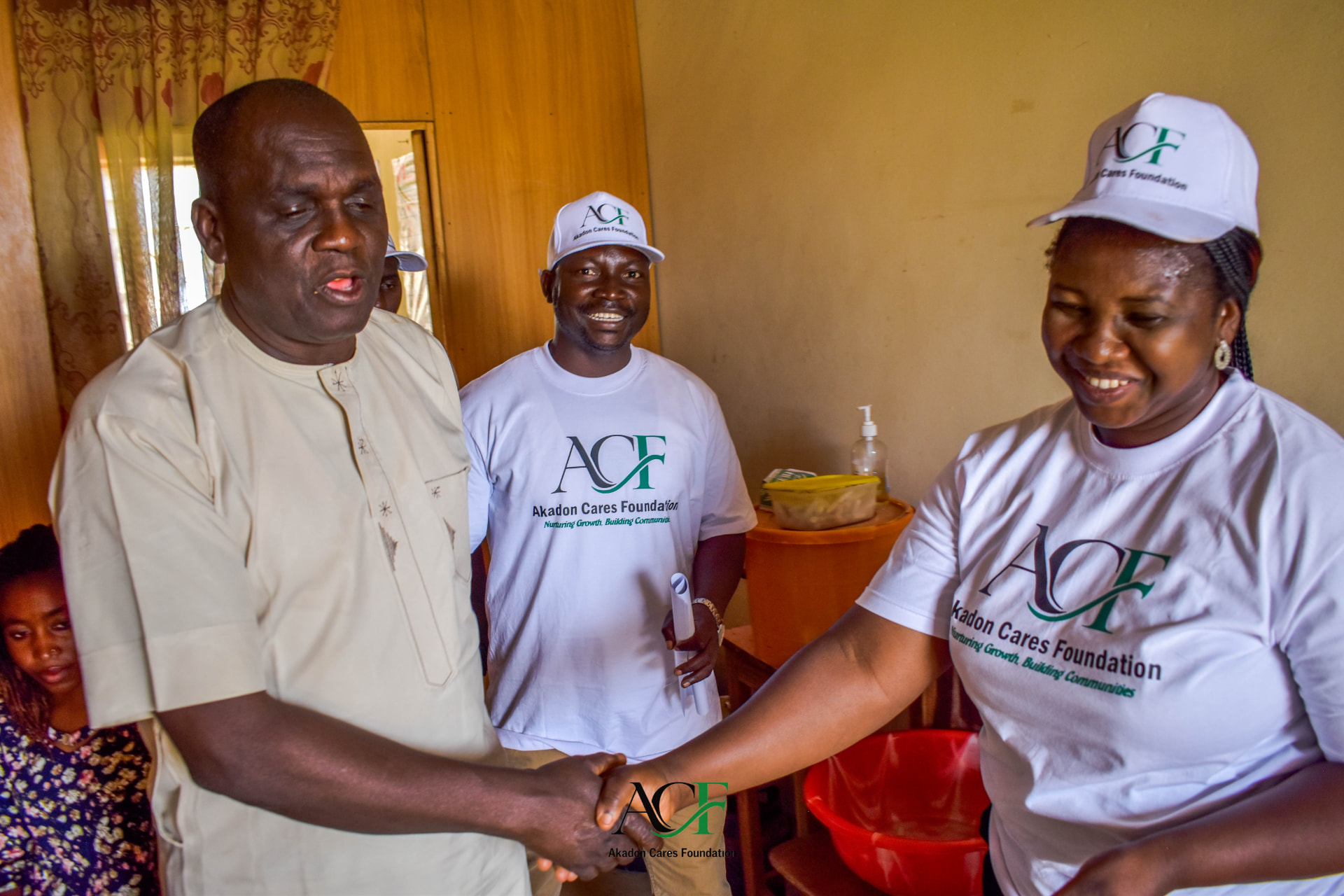 Akadon Cares Foundation team members with community members during an activity visit