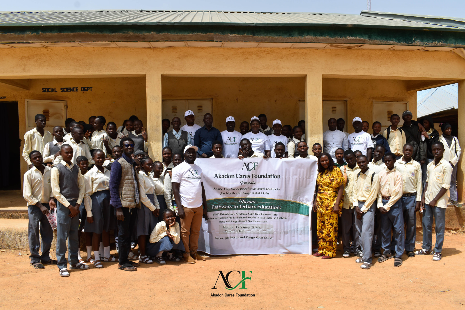 Students and ACF team with the Pathways to Tertiary Education banner